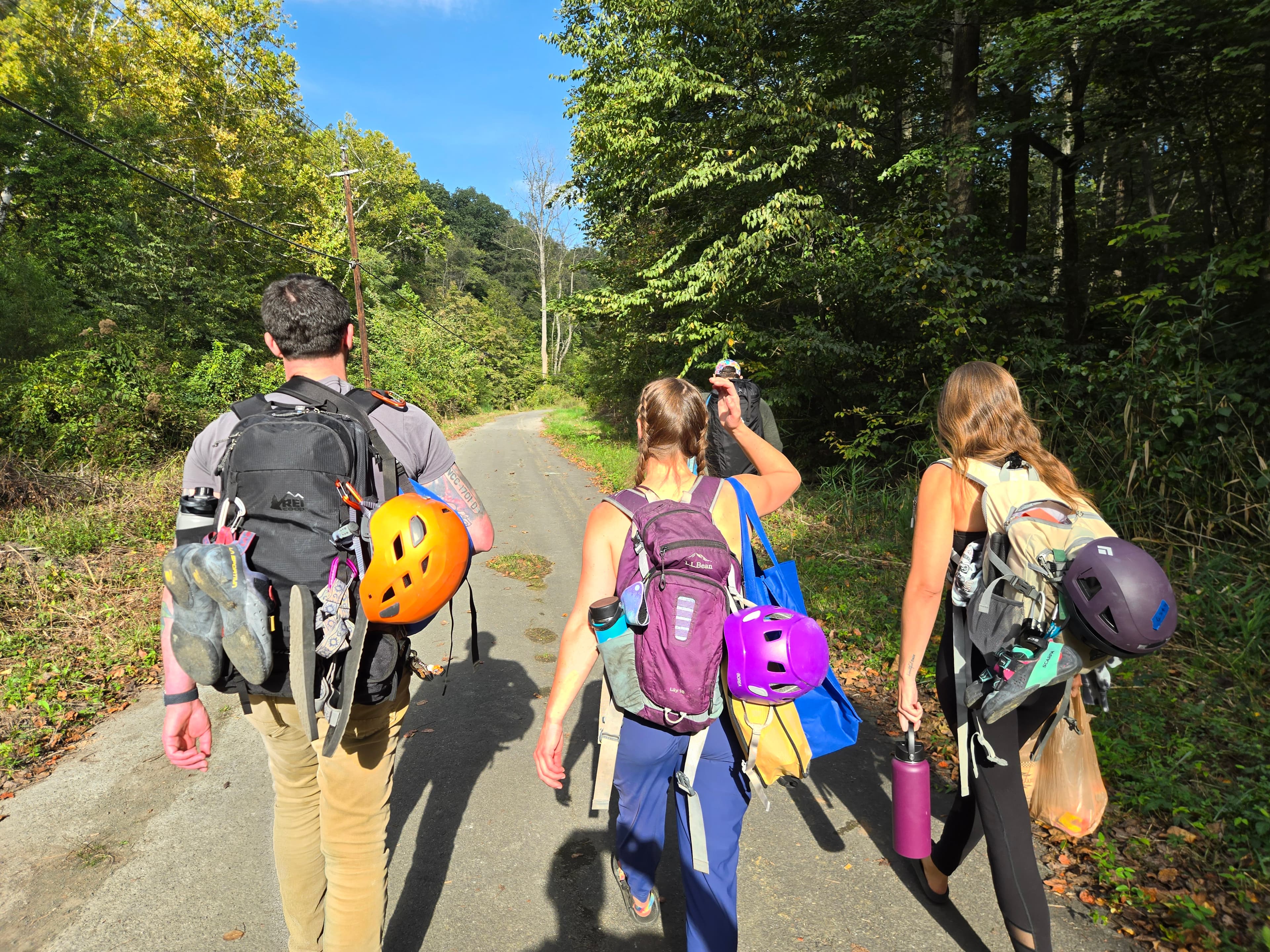 Climbers hiking out to the crag together